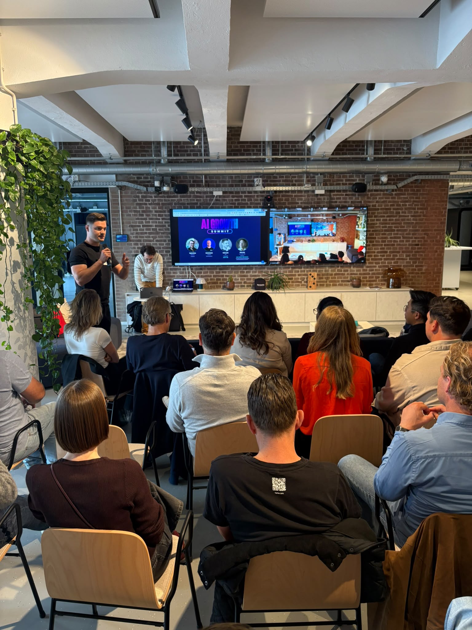 A speaker on stage in Amsterdam