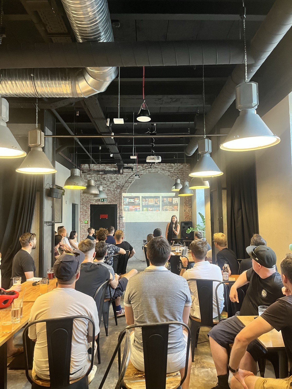 A full room of founders during an afternoon session