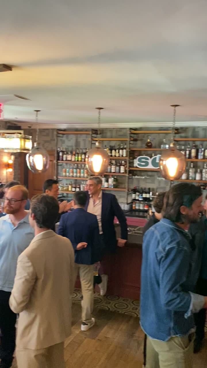 Founders mingling at the bar at the New York City summit